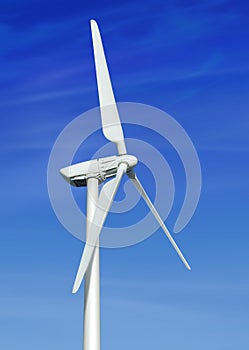 Wind turbine against cloudy blue sky