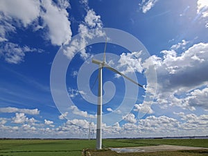 Wind turbine along dike at Ooltgensplaat