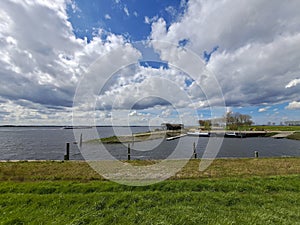 Wind turbine along dike at Ooltgensplaat