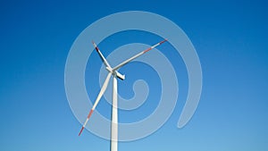 Wind turbine with beautiful blue sky. Eoliche, electricity. Portoscuso, south Sardinia