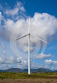 Wind turbine with beautiful blue sky photo