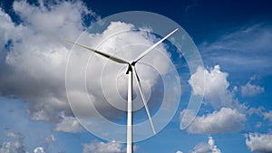 Wind turbine with beautiful blue sky photo