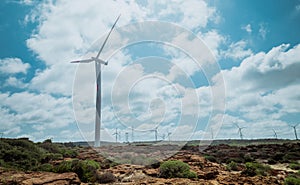 Wind turbine with beautiful blue sky photo