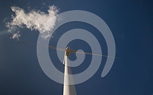 Wind turbine with beautiful blue sky photo