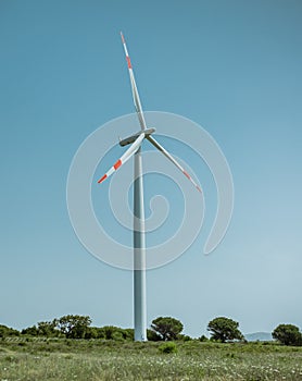 Wind turbine with beautiful blue sky photo