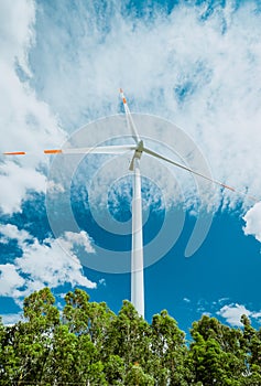 Wind turbine with beautiful blue sky photo