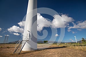 Wind turbine with beautiful blue sky photo