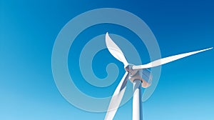 Wind turbine on blue background, sustainable clean energy concept