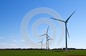 Wind turbine on blue sky