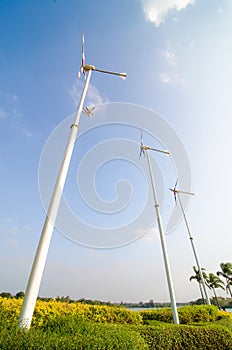 Wind turbine on blue sky