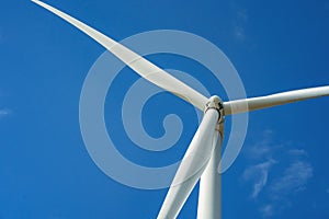 wind turbine and blue sky background. concept clean energy power in nature