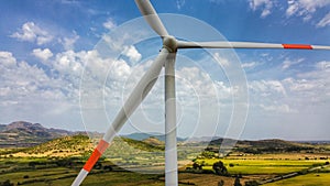 Wind turbine with a cloudy and gray sky, villacidro photo