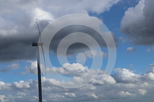 Wind turbine cloudy sky