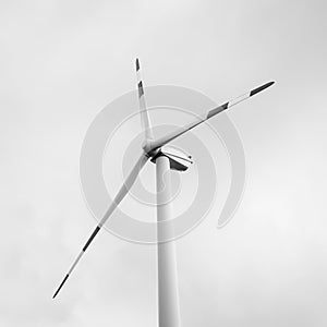 Wind turbine and cloudy sky