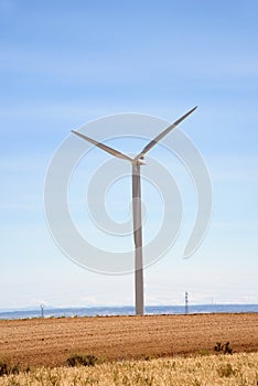 Wind turbine in a desert landscape