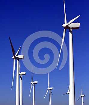Wind turbine farm with blue sky stock photo