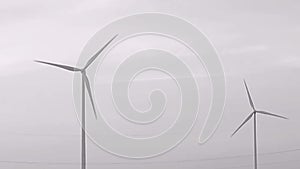 Wind turbine farm with blue sky stock video