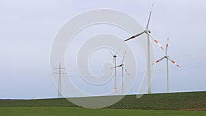 Wind turbine farm generating electricity in a beautiful landscape