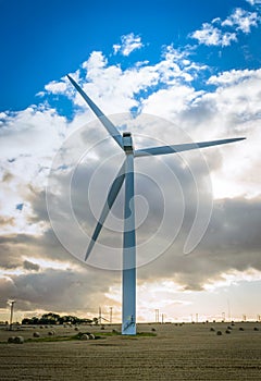 Wind turbine farm on a hillside in England.