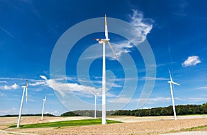 Wind turbine farm on a hillside in Germany