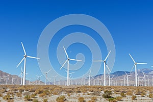 Wind turbine farm for renewal energy at San Gorgonio Pass from Indian Canyon Road near Palm Springs, California, USA