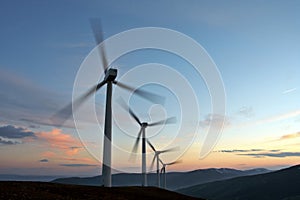 Wind turbine farm turning photo