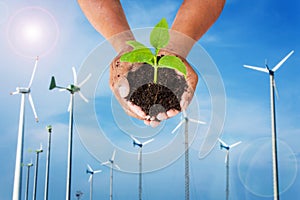 Wind turbine generating electricity on blue sky