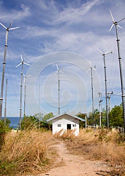 wind turbine generating electricity on hill