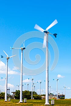 Wind turbine generator and blue sky background