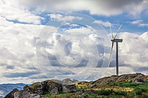 Wind turbine generator on top a hill