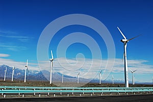 Wind turbine generators by a highway