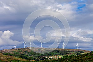 Wind turbine generators on top a hill