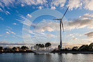 Wind turbine in an industrial area