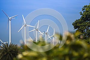 Wind turbine landscape natural energy green Eco power concept at wind turbines farm blue sky