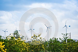 Wind turbine landscape natural energy green Eco power concept at wind turbines farm blue sky