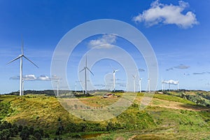 Wind turbine landscape natural energy green Eco power concept at wind turbines farm blue sky background
