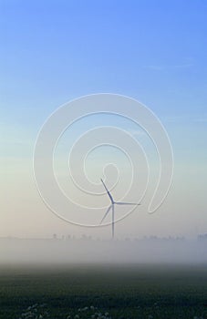 Wind turbine in mist