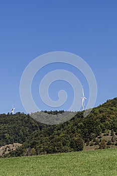 wind turbine in natural landscape environment