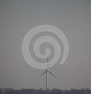 Wind Turbine near Horsey at dusk in February