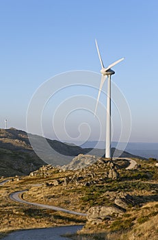 Wind turbine with offroad trail photo