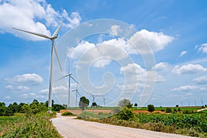 Wind turbine renewable energy source summer with blue sky