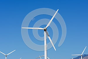 A wind turbine for renewal energy at San Gorgonio Pass from Indian Canyon Road near Palm Springs, California, USA