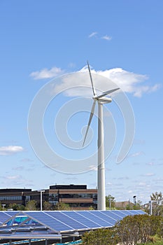 Wind Turbine Rising Above Solar Array