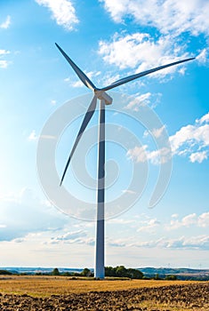 Wind turbine in a rural landscape