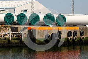 Wind Turbine Sections Stored at a Coastal Port Location