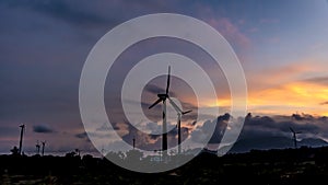 Wind Turbine silhouette on a sunset evening