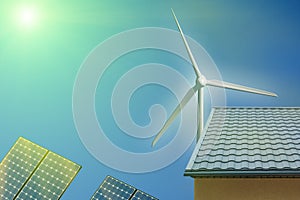 Wind Turbine and Solar panels, photovoltaic and house sunlight. Alternative electricity source concept