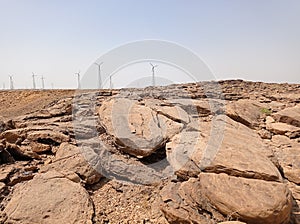 wind turbine and Stones in the Thar Desert high temperature