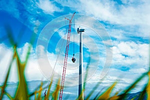 Wind turbine tower clean green renewable energy construction with beautiful landscape