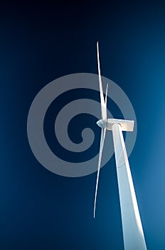 Wind turbine under the blue sky